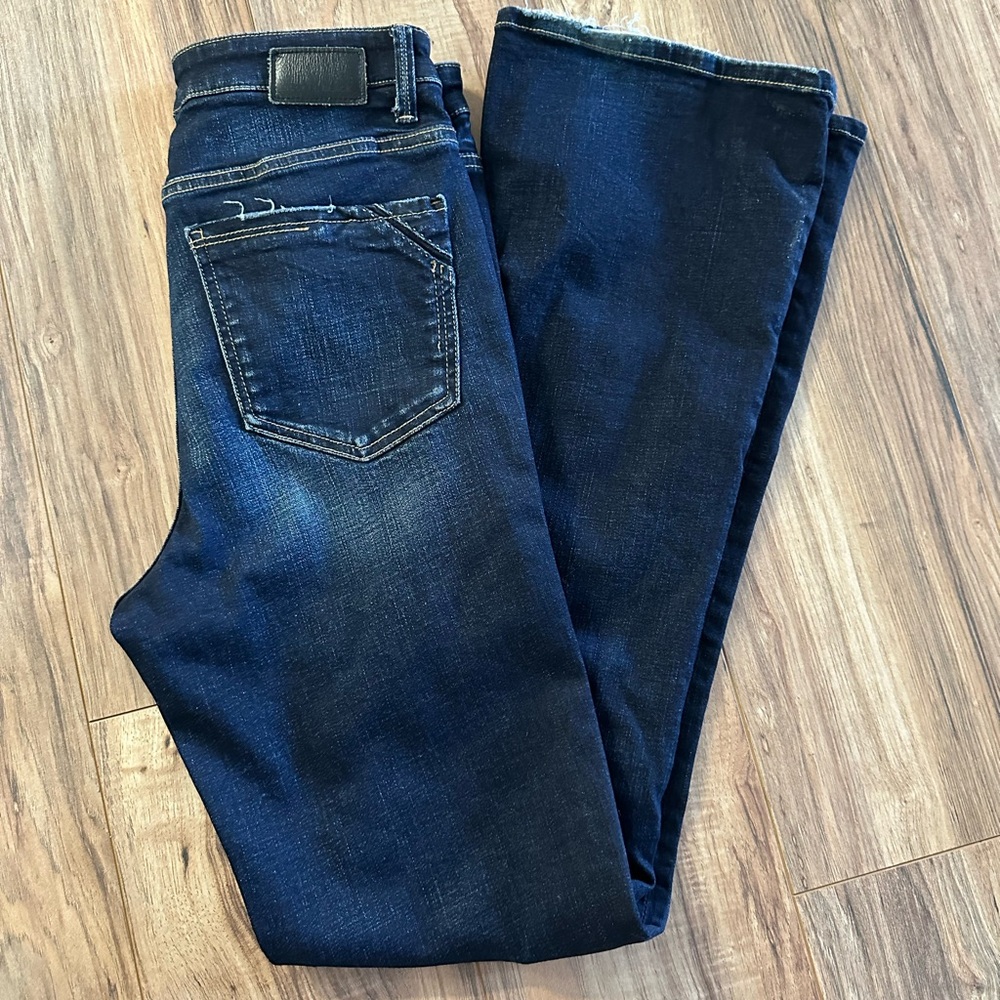 Buckle black. 28x34 bootcut. like new condition.